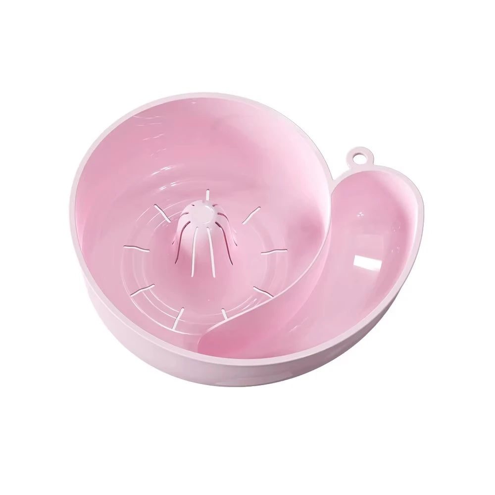 Pink strainer on a white background