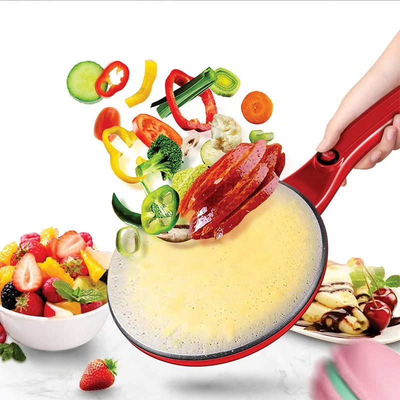 Red frying pan with food and vegetables on a white background