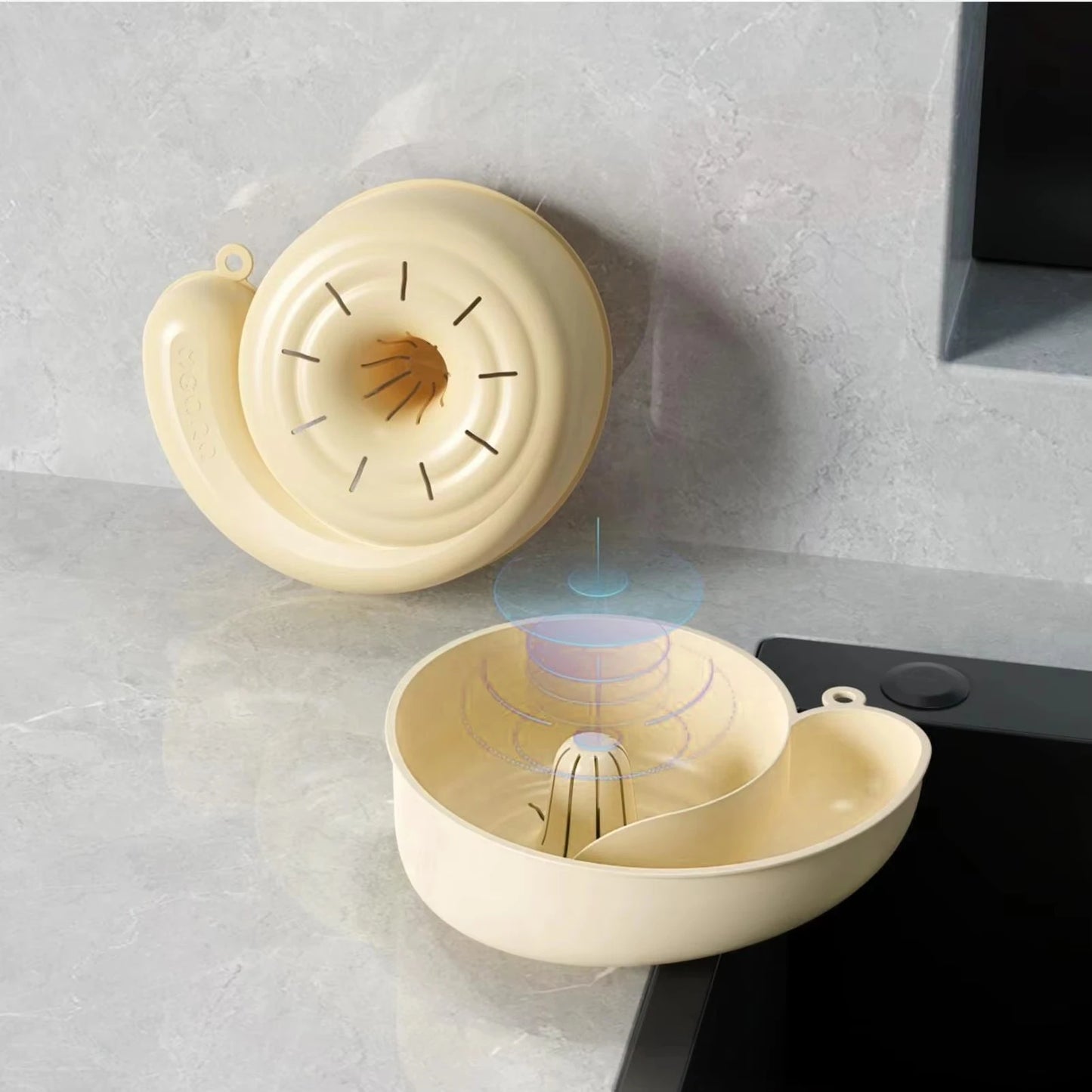 Beige kitchen sink strainer on a gray countertop