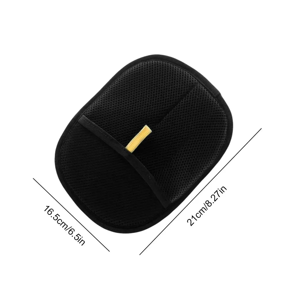 Black pet hair brush with a yellow strap and measurements on a white background