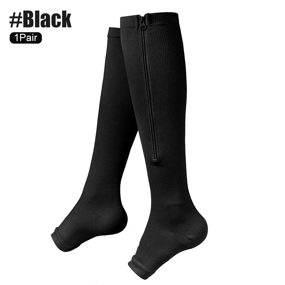 Black knee-high compression socks with a zipper on a white background